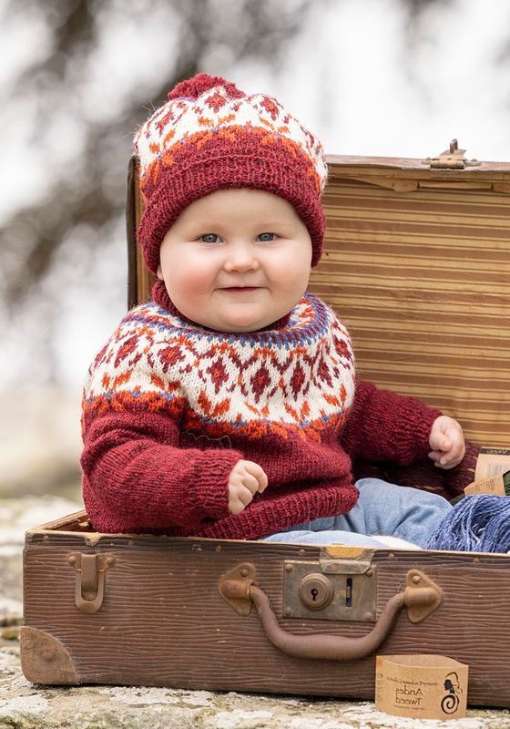 Seidra genser og lue